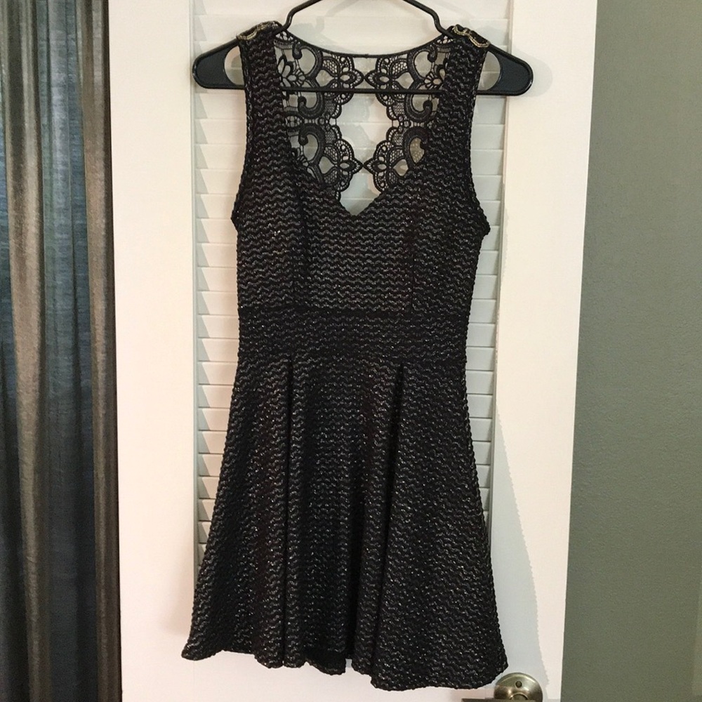 Little black dress with gold accents